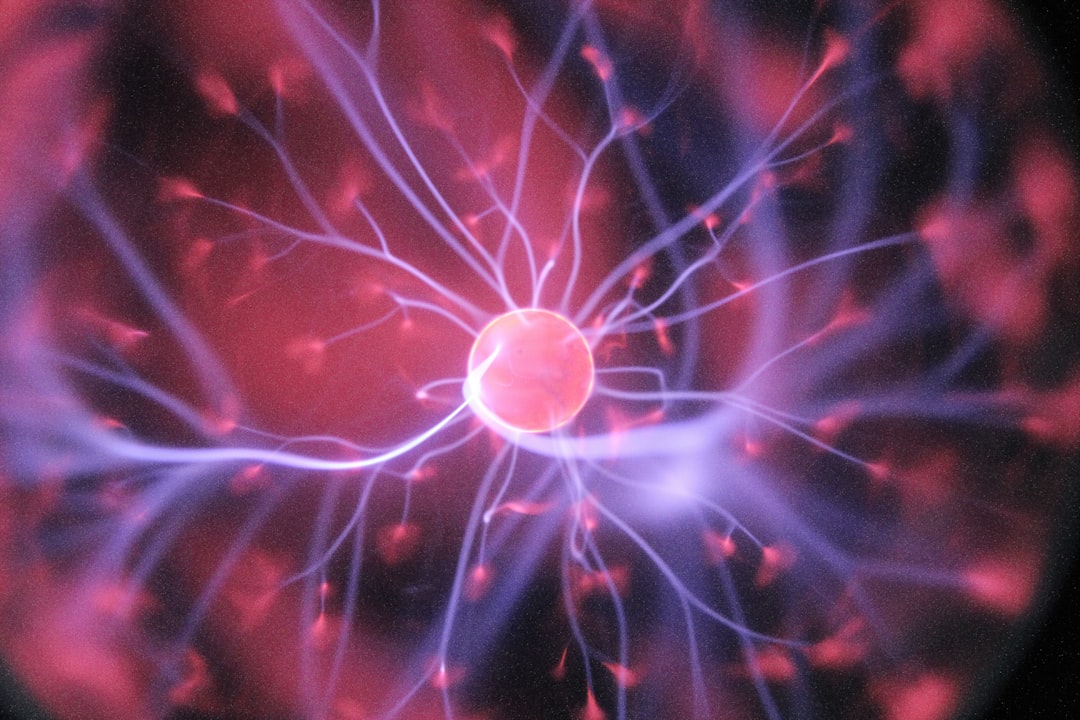 Soft neon colored abstract neurons lighting up - Photo by Hal Gatewood on Unsplash